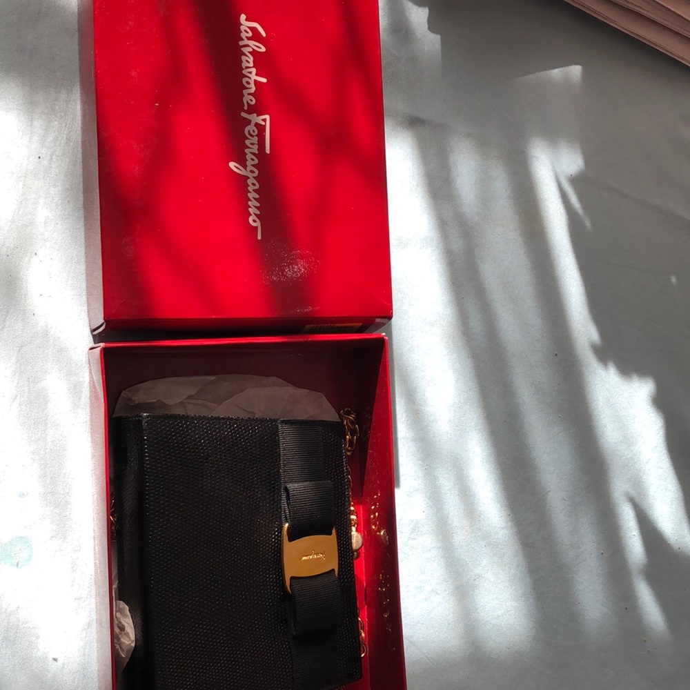 Salvatore Ferragamo black leather purse.